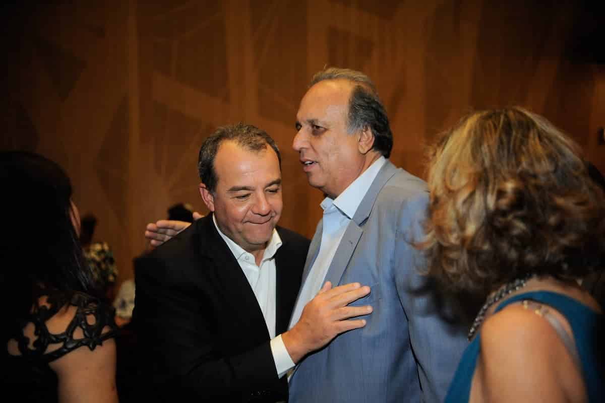 ex-governador Sergio Cabral e o ex-governador Luiz Fernando Pezão em evento