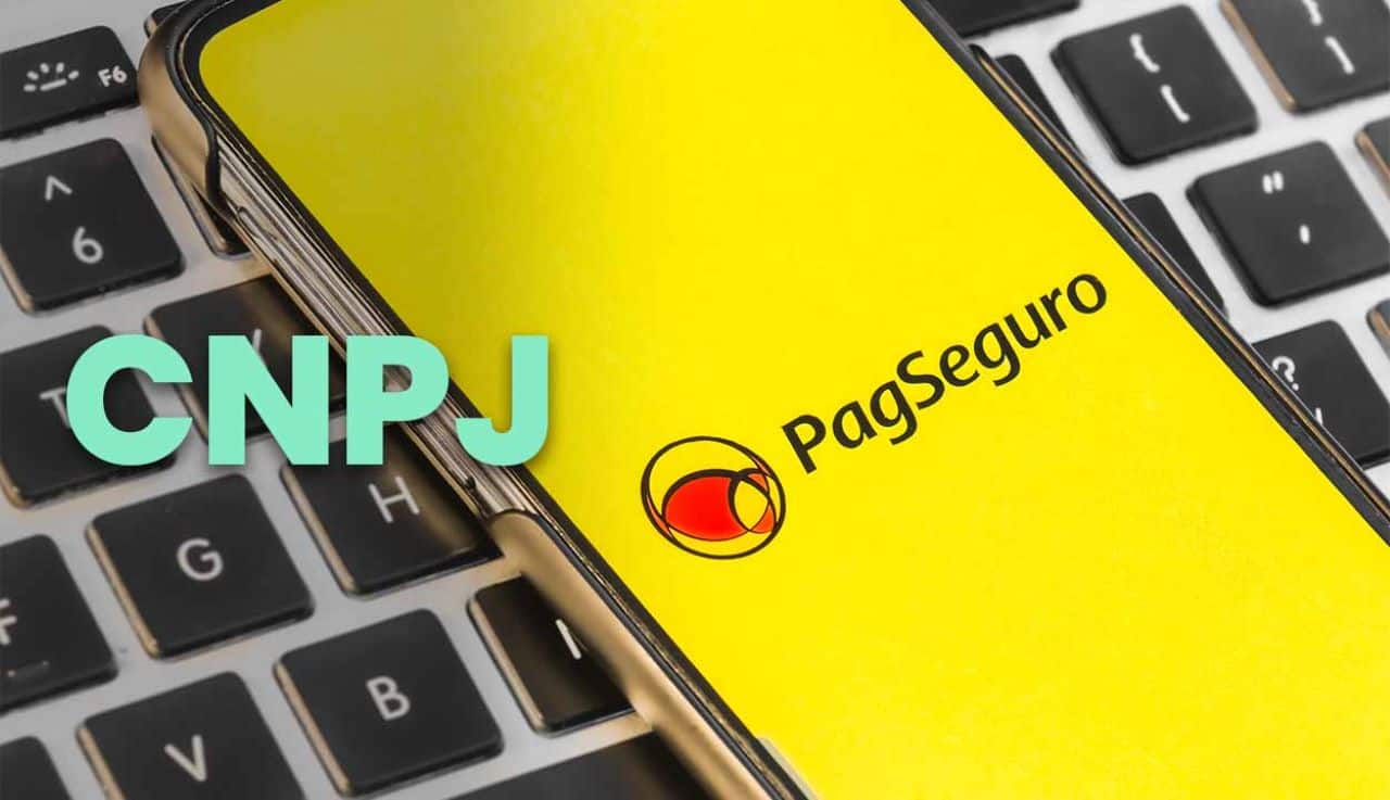 celular em cima de um teclado iniciando o aplicativo do pagseguro