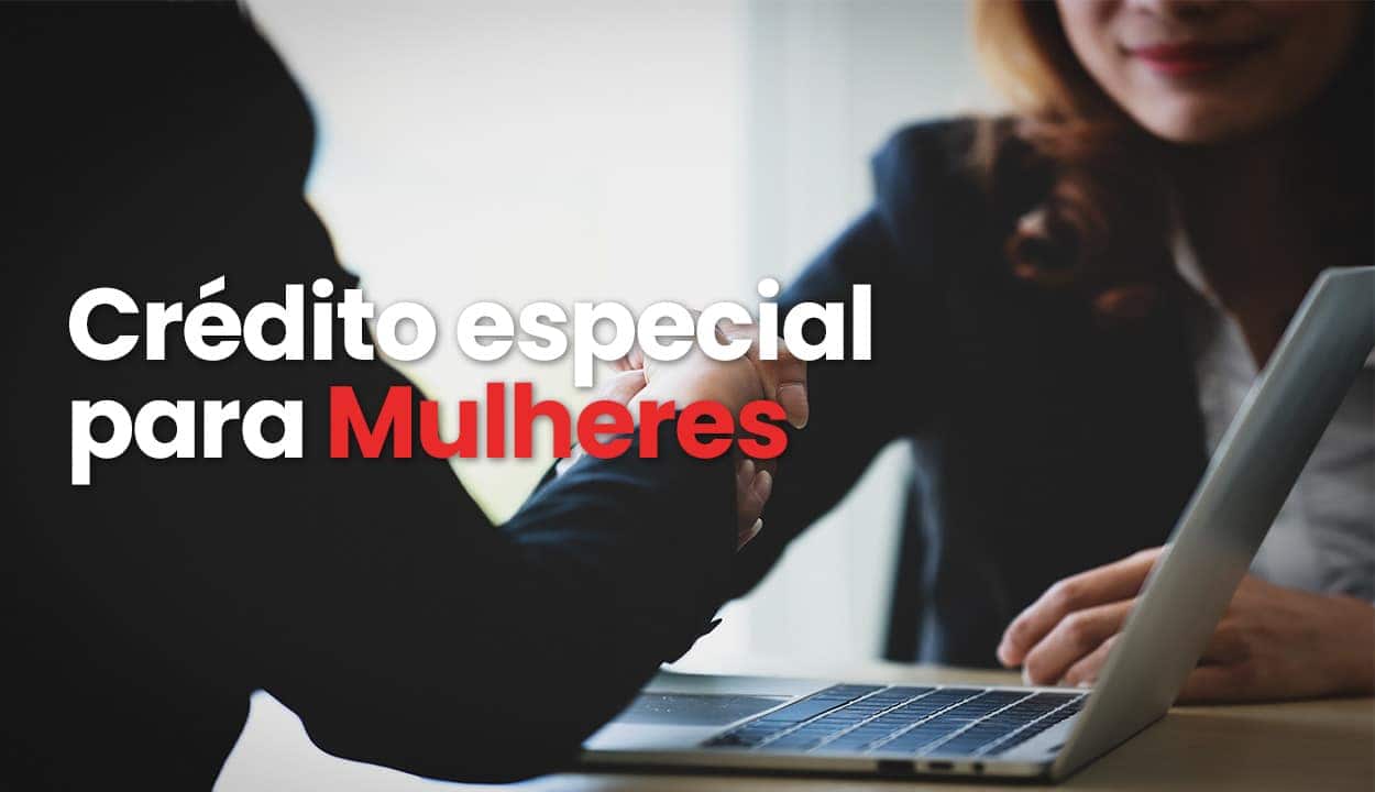 Mulher aperando a mão de um homem, com um computador na frente e um texto: crédito especial para mulheres