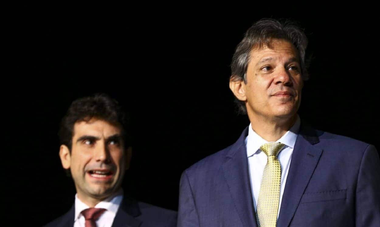 Fernando Haddad ao lado de Gabriel Galípolo