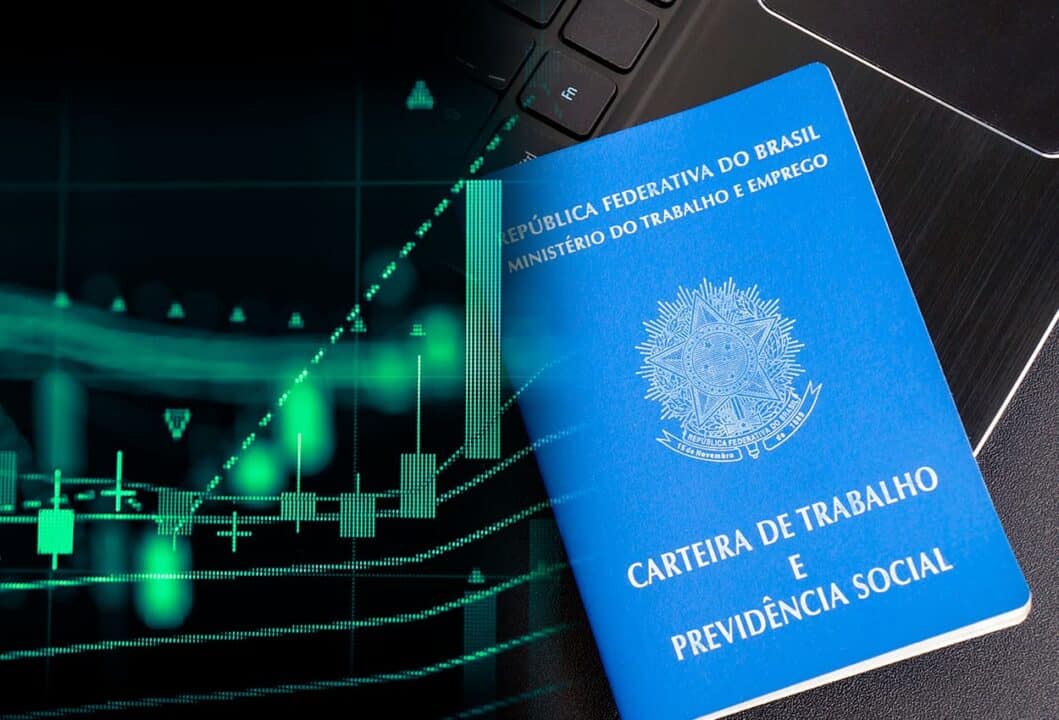Carteira de trabalho com gráficos virtuais ao lado