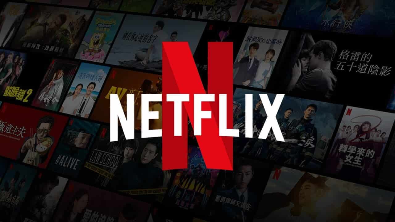 Logo vermelho da Netflix com várias séries no fundo