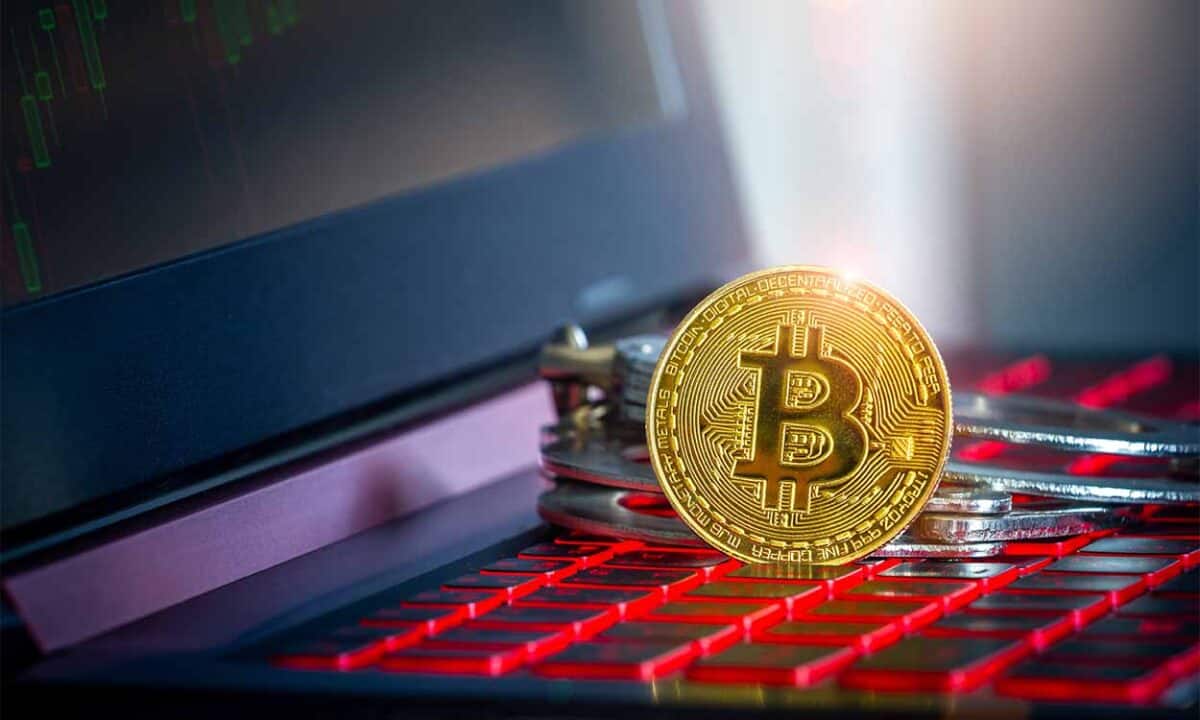 Moeda com logo do Bitcoin