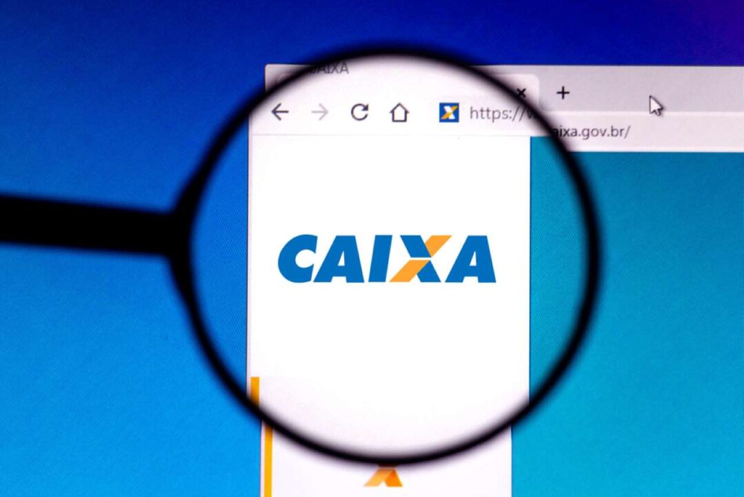 Lupa destacando o site da Caixa Econômica